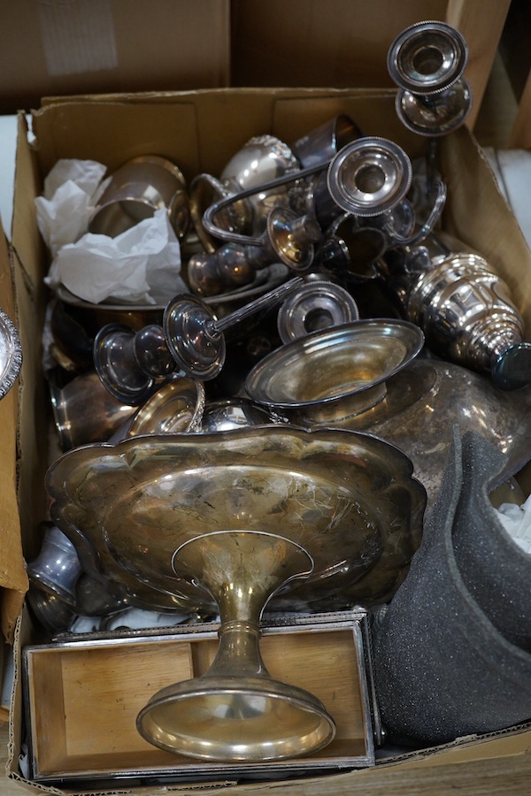 A quantity of assorted plated wares to include candelabra, wine coolers and pedestal dishes. Condition - varies, mostly fair